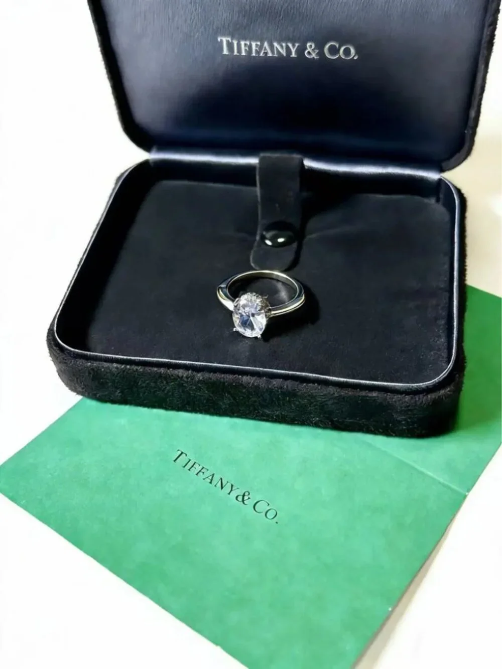 Tiffany & Co. Oval Center Stone and Side Stone Ring